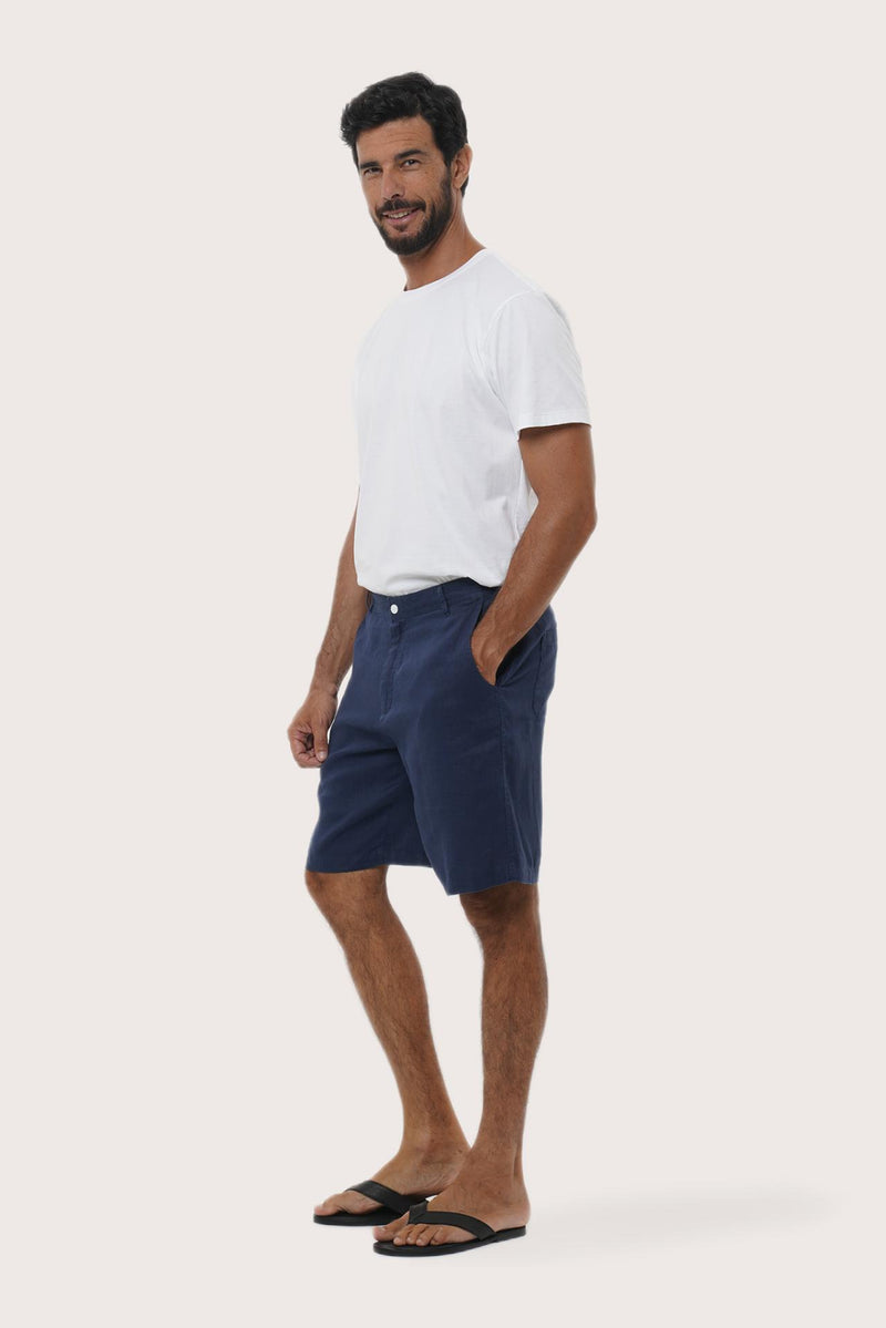 Side profile of the La Brisa linen bermuda shorts showcasing their effortless fit