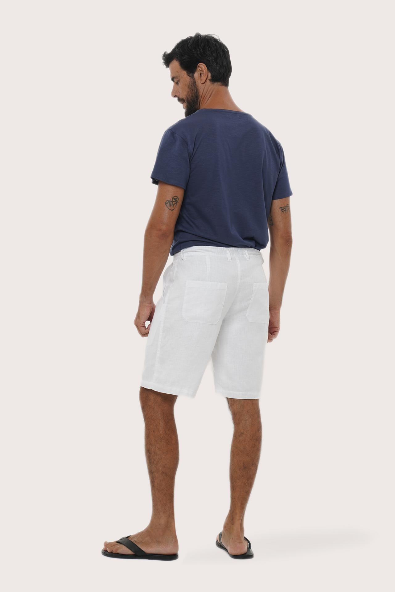 Back view of the white linen bermuda shorts with a relaxed and tailored silhouette