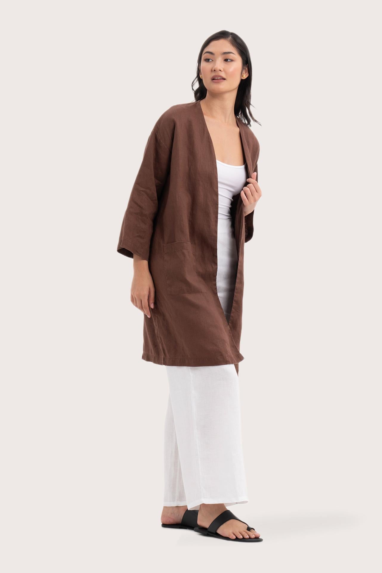 Side profile of the Linen Haori Outerwear Mahogany showing its cut and natural movement