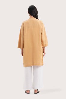 Back view of the Linen Haori Outerwear Pale Apricot highlighting the garment shape and drape