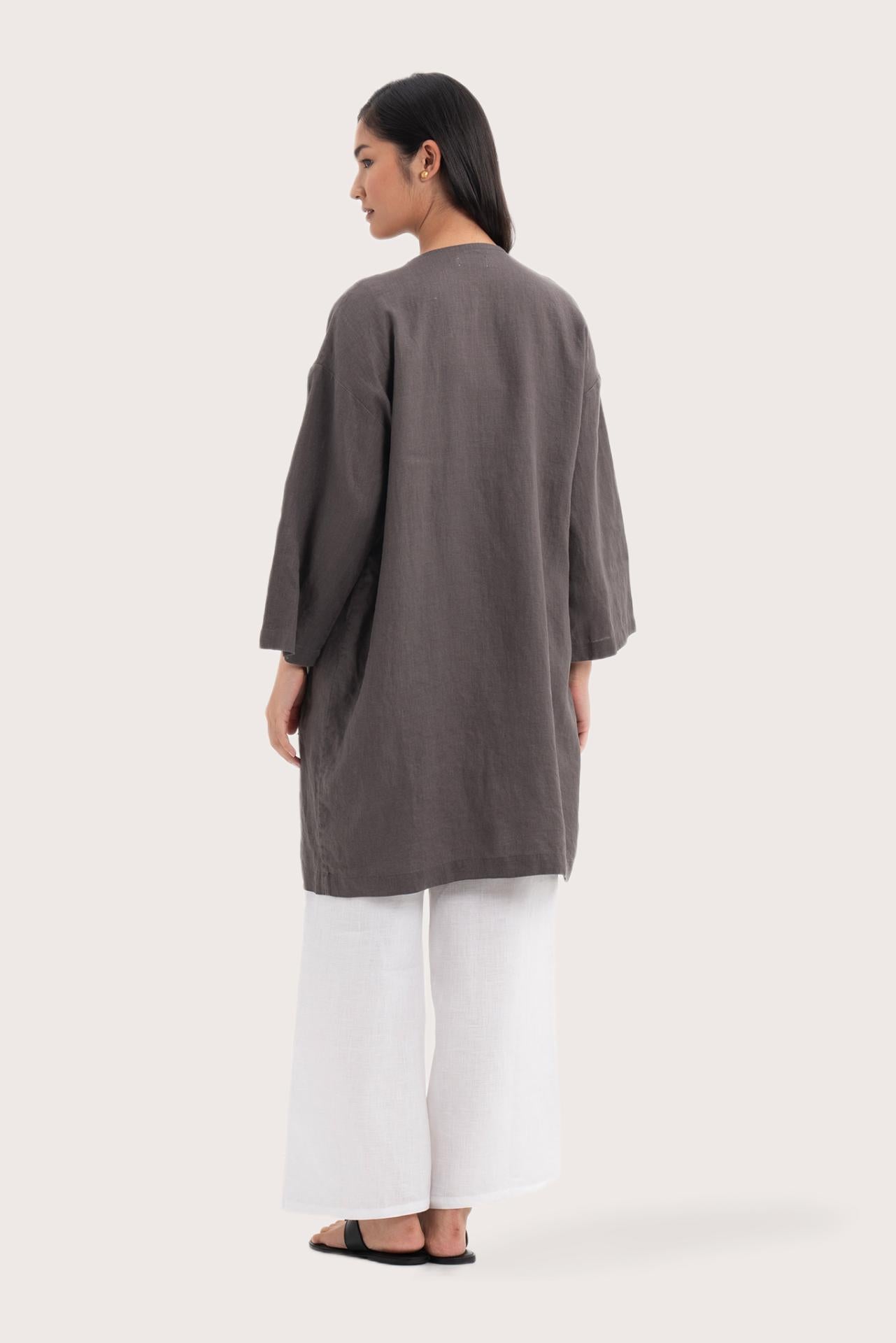 Back view of the Linen Haori Outerwear Stone highlighting the garment shape and drape