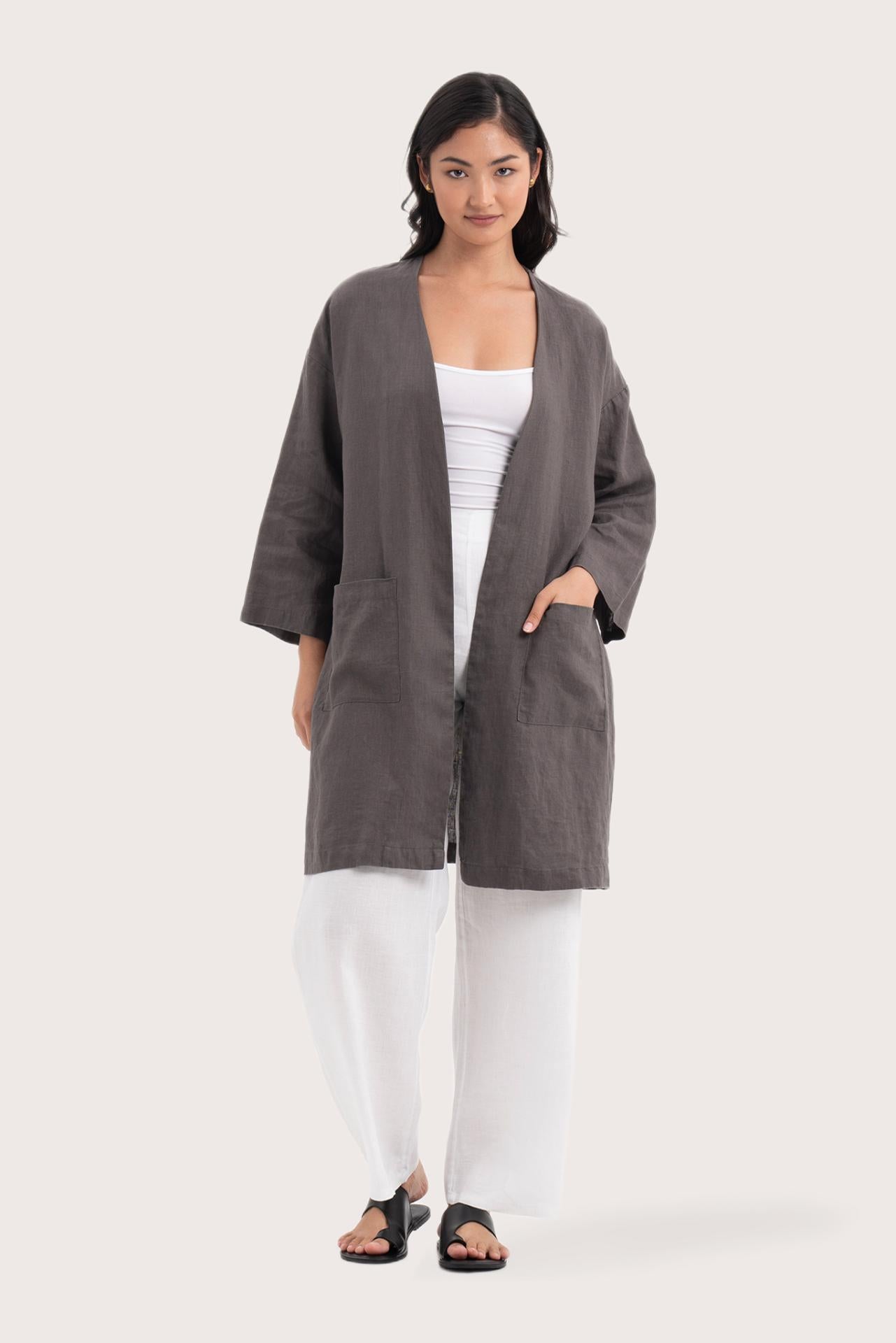 Woman wearing the Linen Haori Outerwear Stone designed for effortless resortwear and tropical living by By The Sea Bali