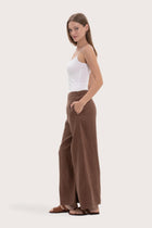Side profile of the choco linen maxi length pants showcasing the wide-leg cut