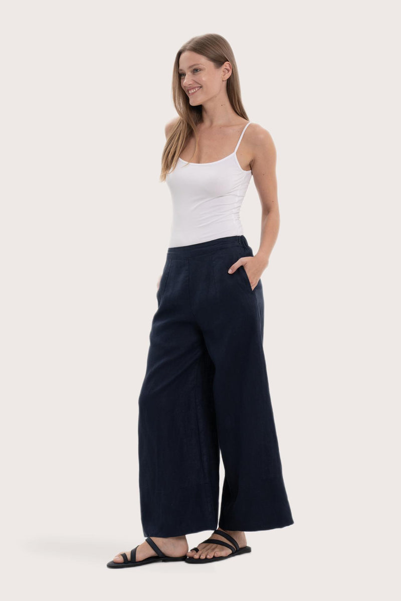Side profile of the navy linen maxi length pants showcasing the wide-leg cut