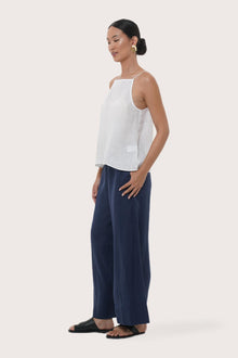 Side profile showing the flattering relaxed cut and breathable linen construction