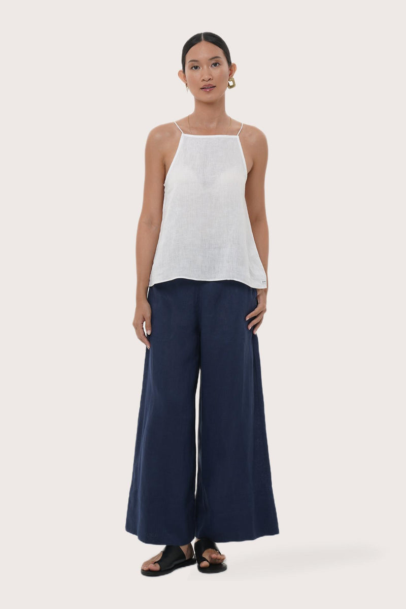Women's white linen square top featuring a relaxed silhouette crafted from breathable natural linen for effortless resort wear and tropical summer styling by By The Sea Bali