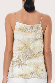Close-up view of the Linen Square Top showcasing artisanal island-inspired detailing