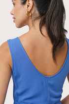Close up detail of the Lisa Playsuit Blue highlighting craftsmanship and design features