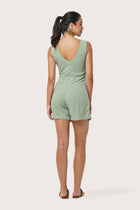 Back view of the Lisa Playsuit Sage highlighting the garment shape and 
