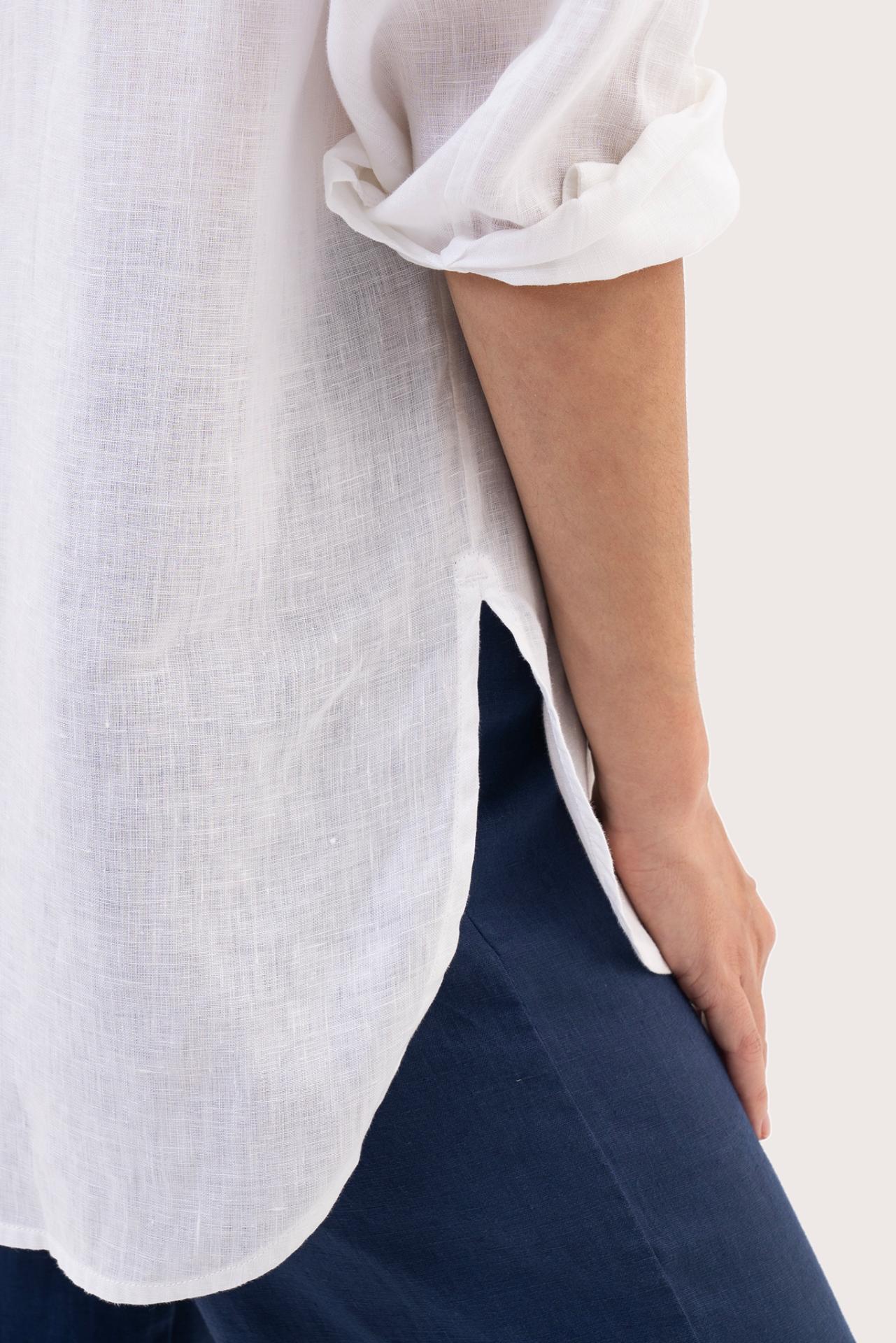Close-up of the hem of the Loose highlighting clean stitching and durable garment finishing.