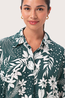 Close up detail of the Lupita Midi Dress Green highlighting craftsmanship and design features