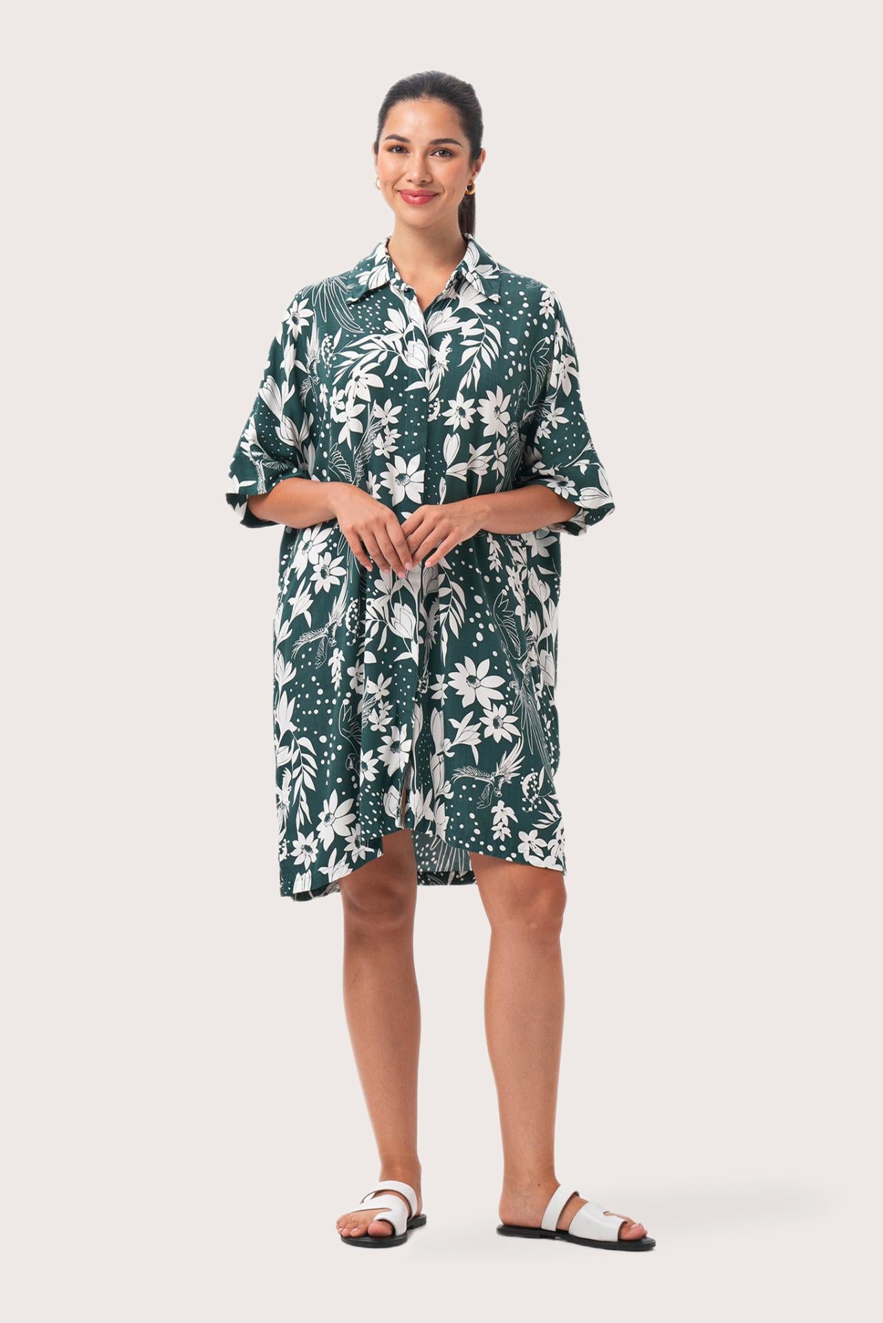 Woman wearing the Lupita Midi Dress Green designed for effortless resortwear and tropical living by By The Sea Bali