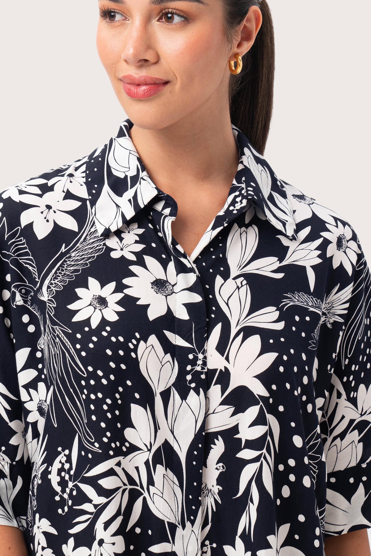 Close up detail of the Lupita Midi Dress Navy highlighting craftsmanship and design features
