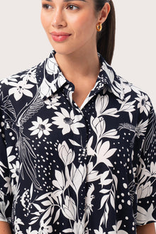 Close up detail of the Lupita Midi Dress Navy highlighting craftsmanship and design features
