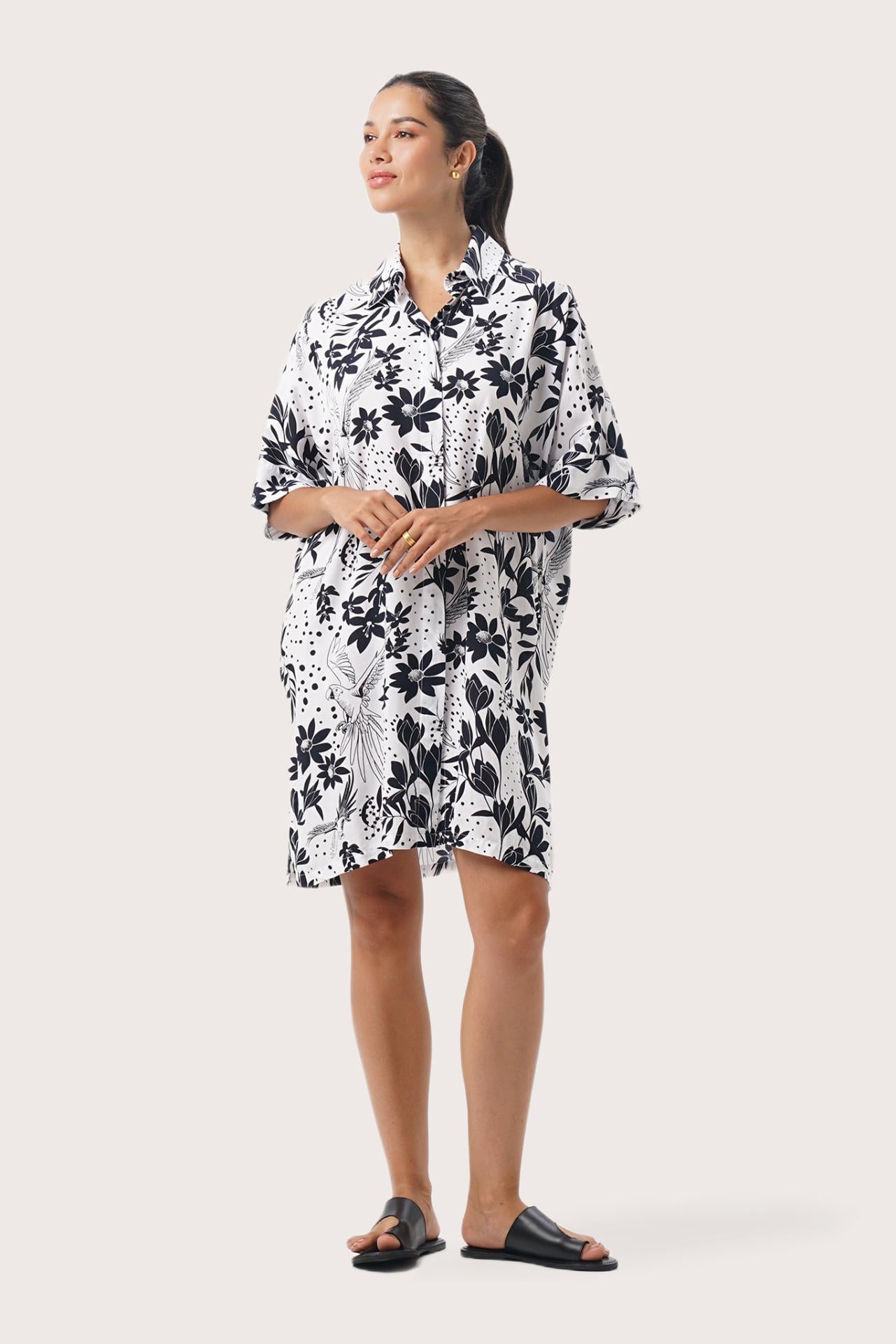 Woman wearing the Lupita Midi Dress White designed for effortless resortwear and tropical living by By The Sea Bali