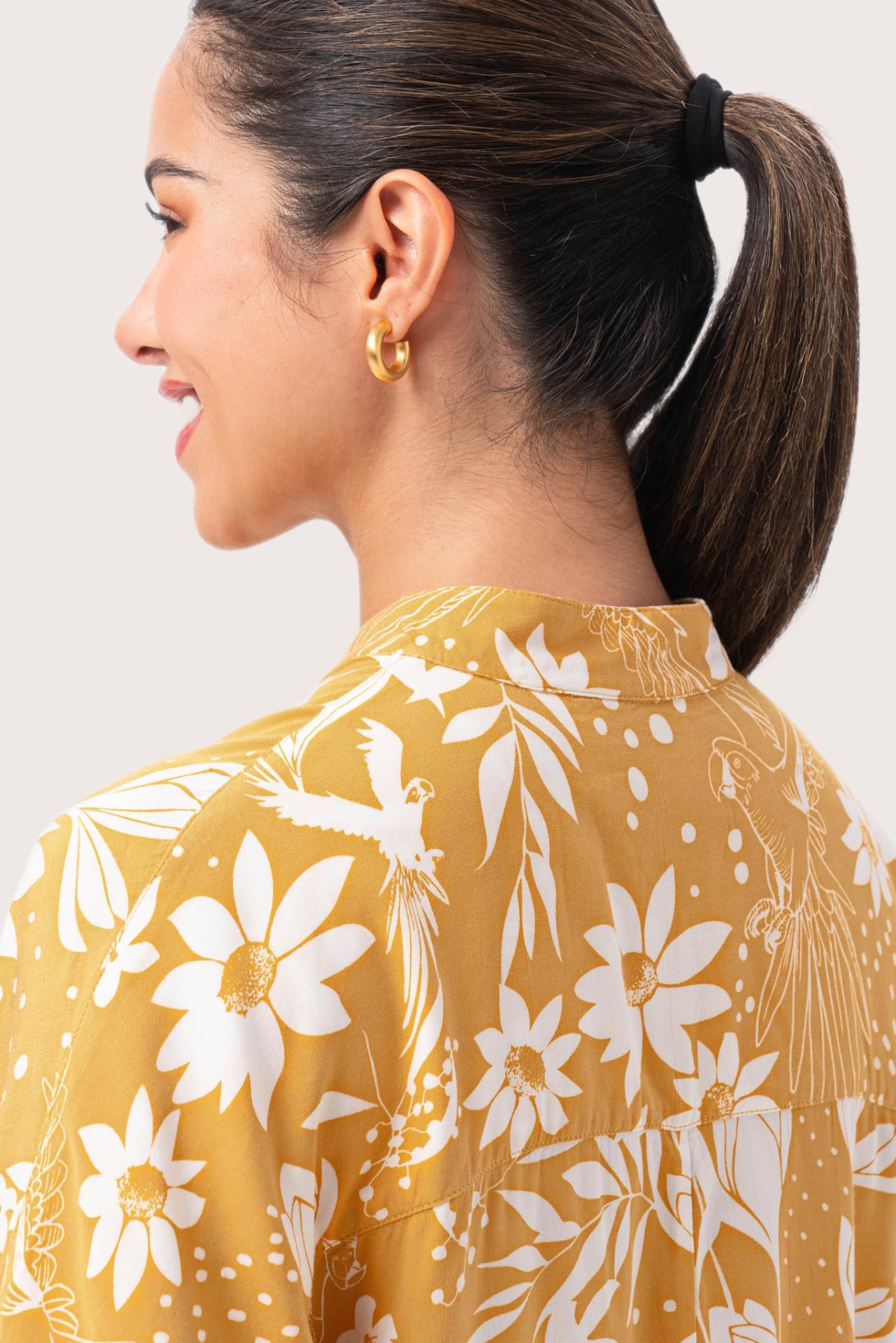 Close up detail of the Lupita Midi Dress Yellow highlighting craftsmanship and design features