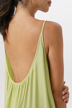 Close up detail of the Mala Lowback Maxi Dress Lime Green highlighting craftsmanship and design features