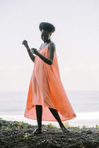 Woman wearing the Mala Lowback Maxi Dress Rosa designed for effortless resortwear and tropical living by By The Sea Bali