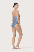 Side profile of Mara One Piece Swimsuit Stripes Strifu highlighting its sleek shape