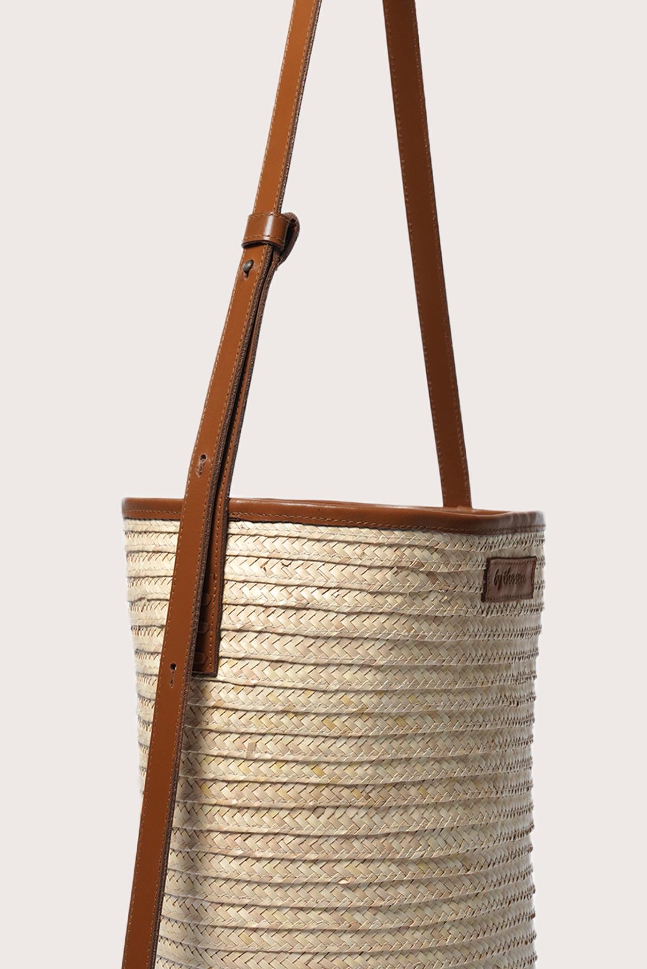Side view of the Marine Bag Light Brown highlighting its structured shape and versatile design
