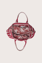 Full view of the Marmara Stripe Tote Bag Stripes capturing its spacious design and effortless vacation appeal