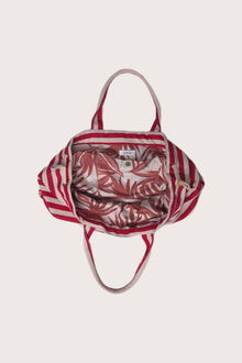 Full view of the Marmara Stripe Tote Bag Stripes capturing its spacious design and effortless vacation appeal