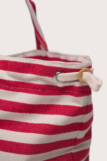 Side profile of the Marmara Stripe Tote Bag Stripes highlighting its spacious structure and elegant striped detailing