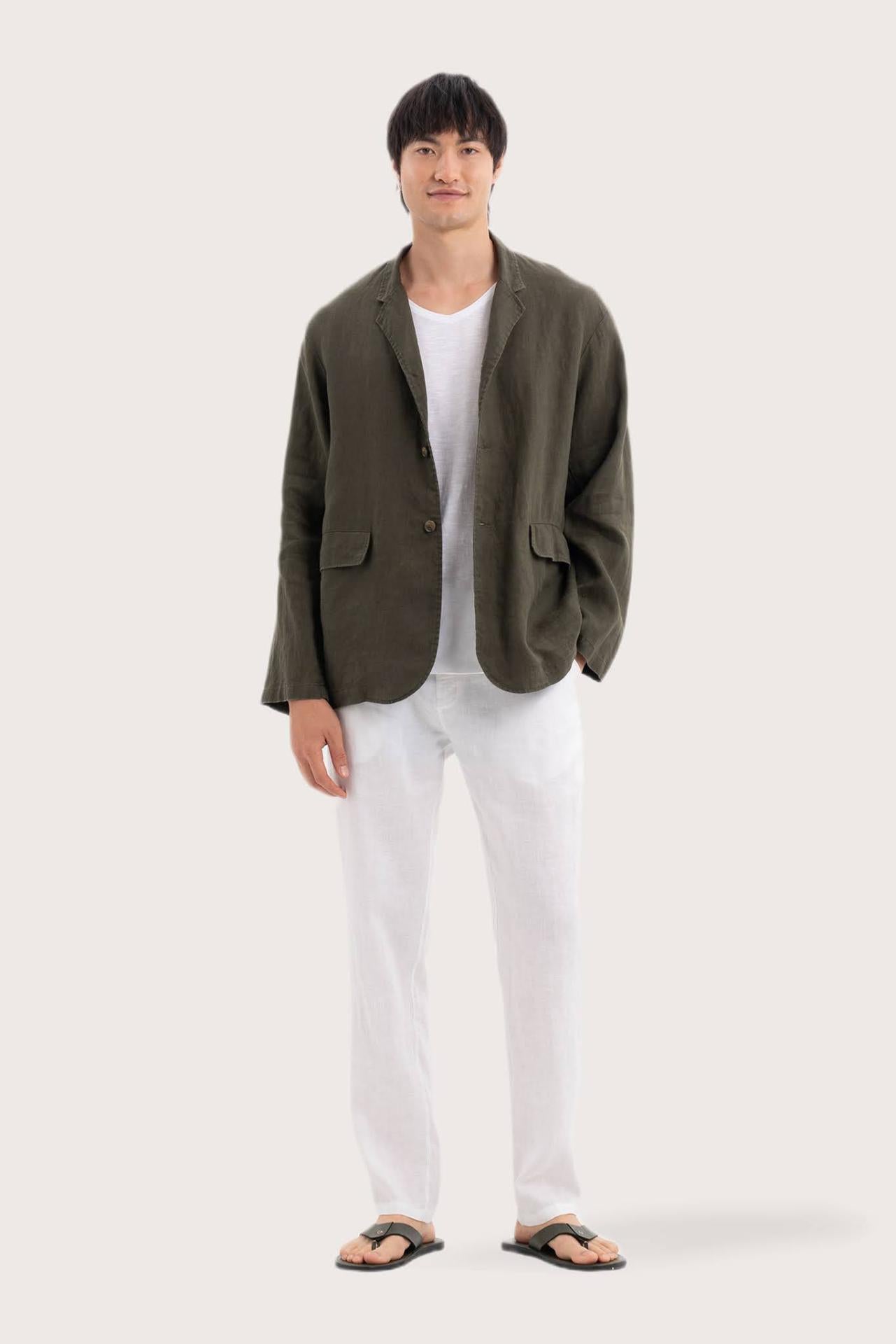 Model wearing the dark green linen Masa jacket by By The Sea Bali