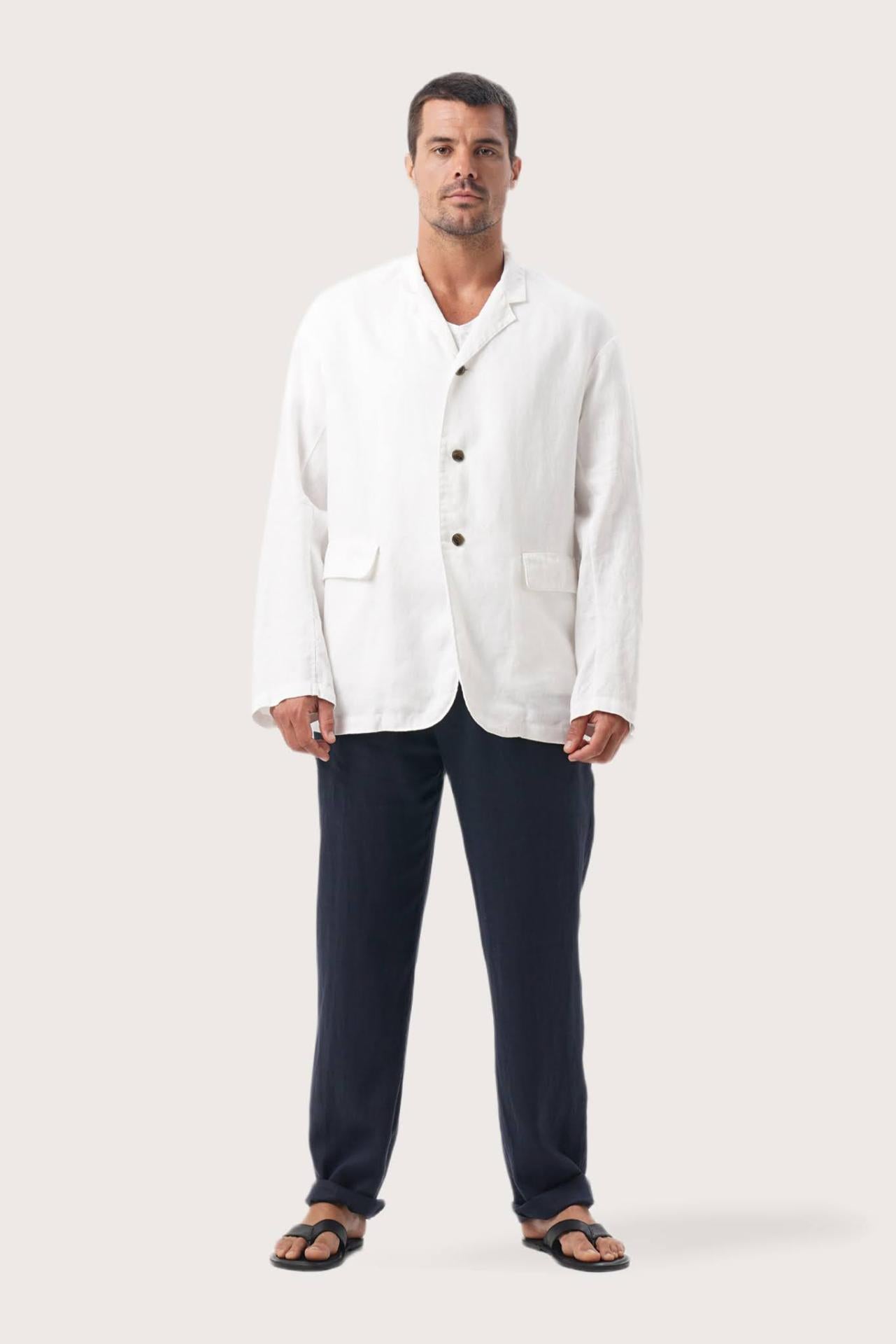 Model wearing the natural white linen Masa jacket by By The Sea Bali