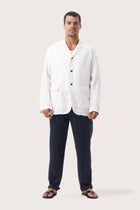 Model wearing the natural white linen Masa jacket by By The Sea Bali
