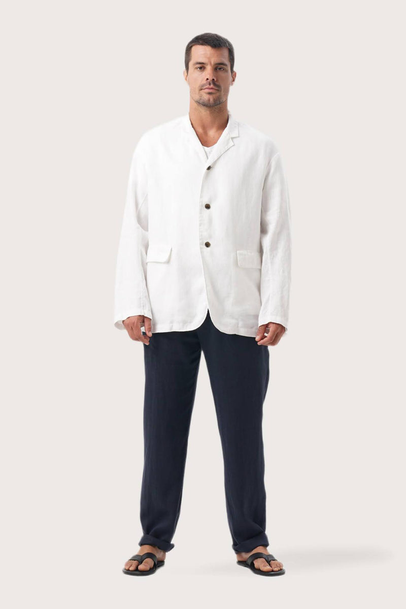 Model wearing the natural white linen Masa jacket by By The Sea Bali