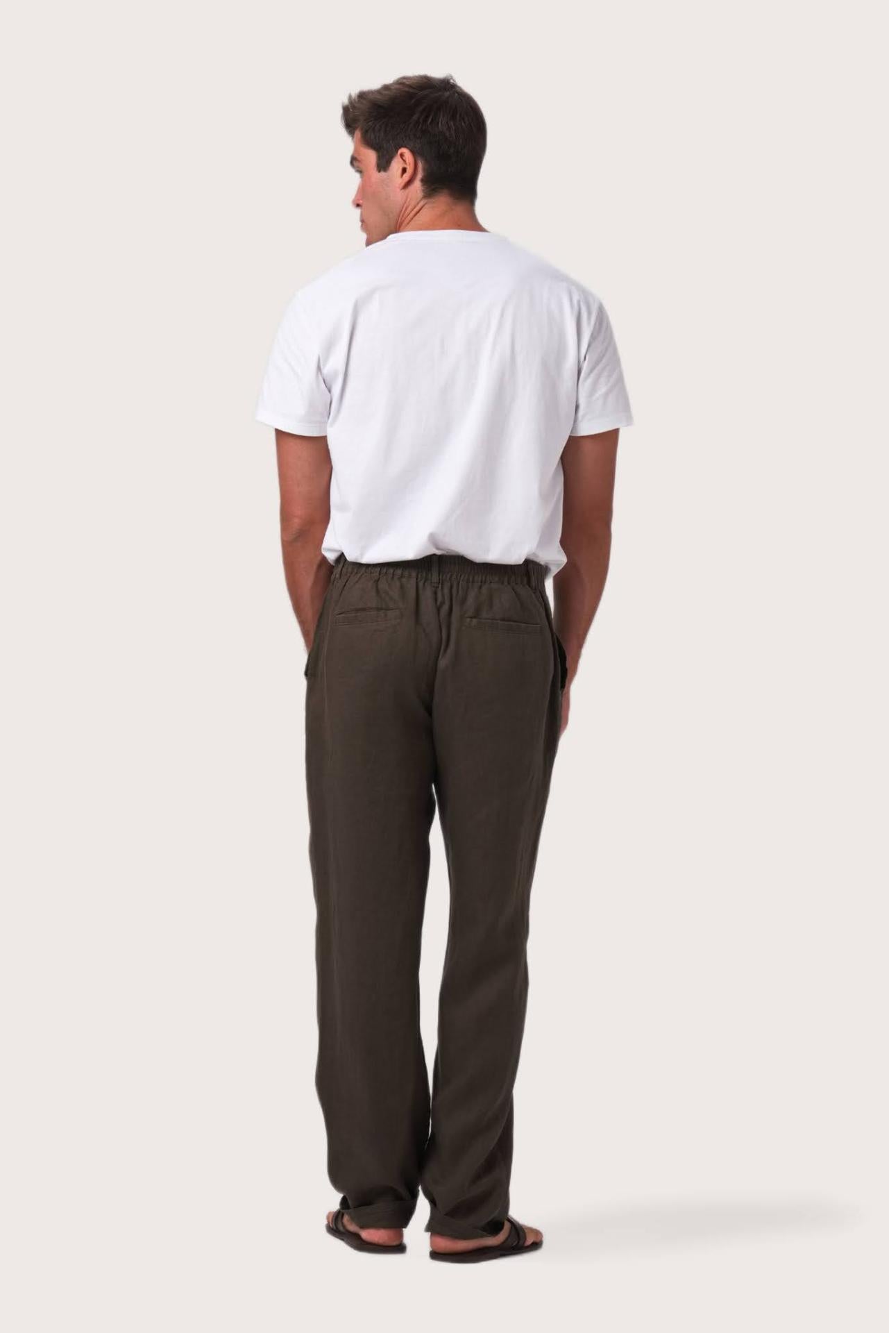 Back view of the Chocolate Maury Linen Long Pant showcasing its slit pockets and belt loops by By The Sea Bali