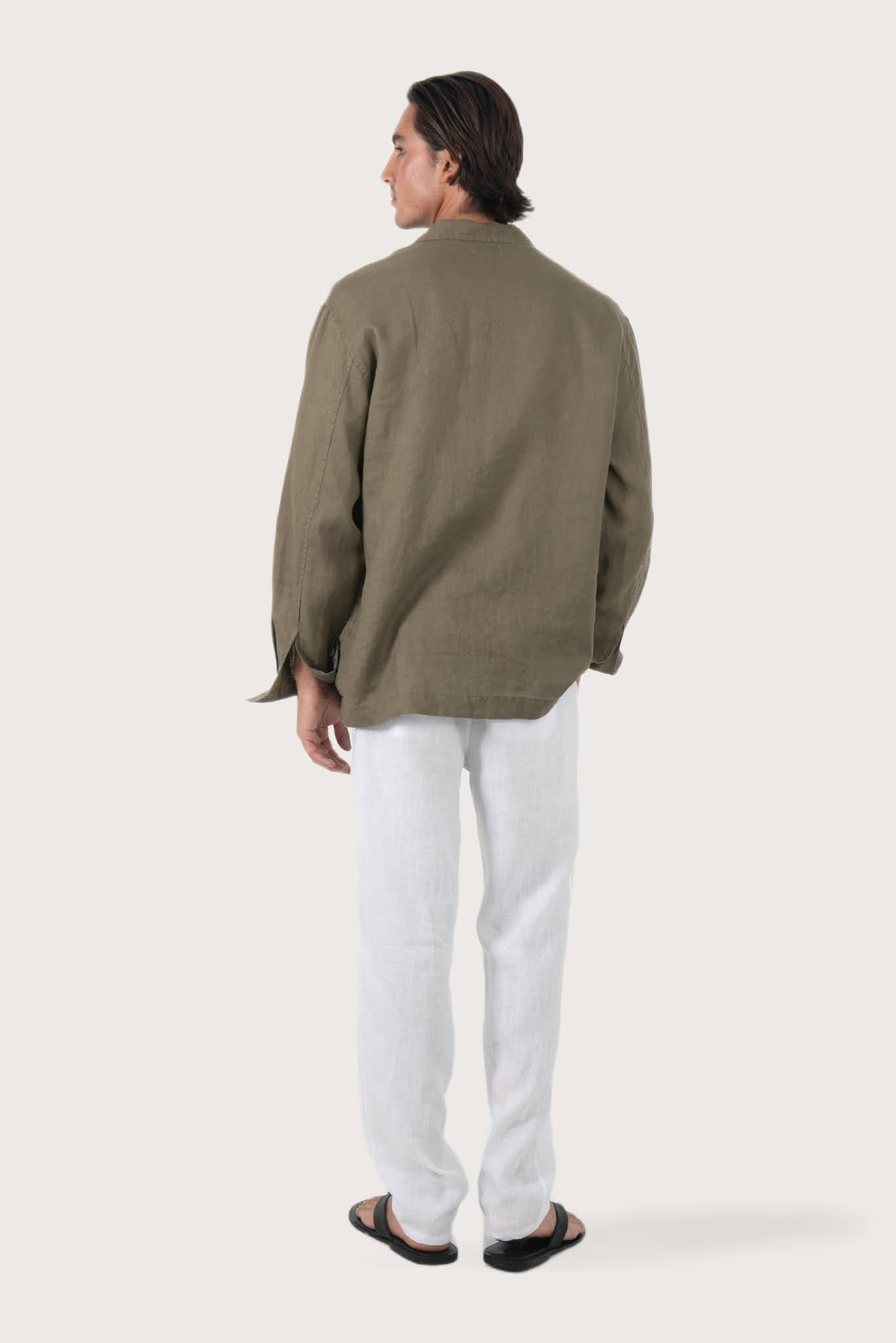 Back view of the brown linen jacket with a relaxed and contemporary silhouette