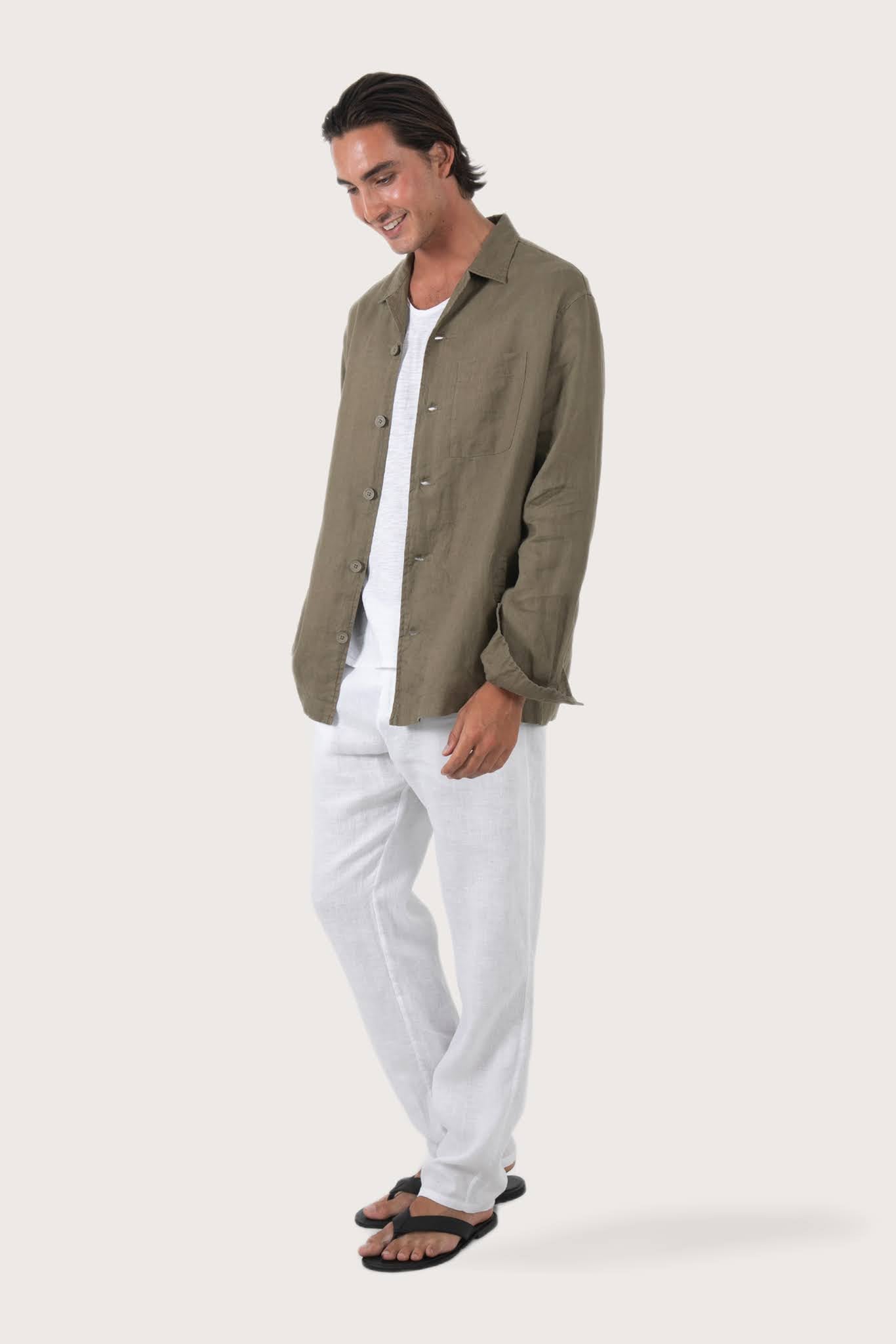 Side profile of the brown linen jacket showcasing its comfortable fit and effortless drape