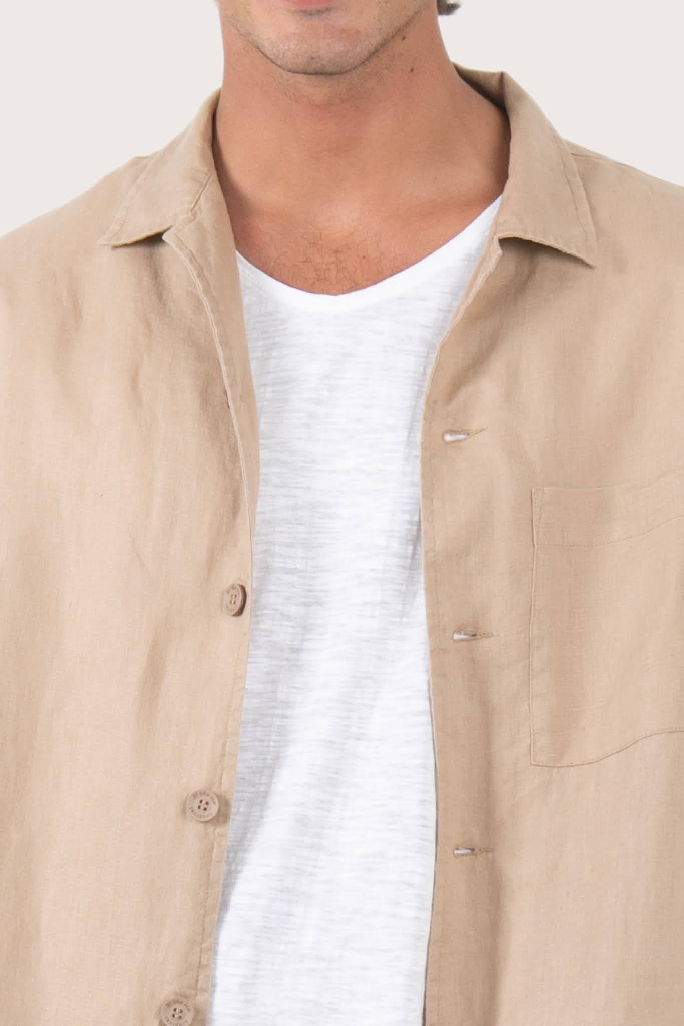 Detailed back view highlighting the linen construction and relaxed silhouette