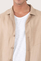 Detailed back view highlighting the linen construction and relaxed silhouette