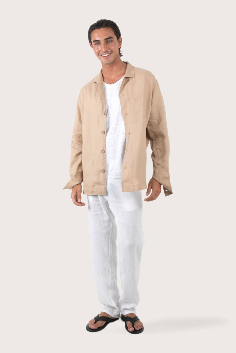 Model wearing the creme linen Maverick jacket by By The Sea Bali
