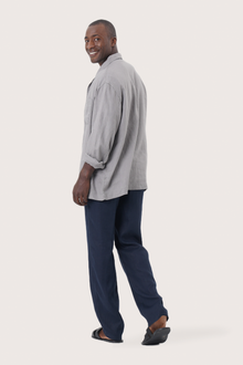 Back view of the grey linen jacket with a relaxed and contemporary silhouette