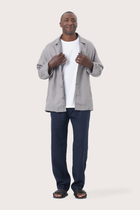 Model wearing the grey linen Maverick jacket by By The Sea Bali