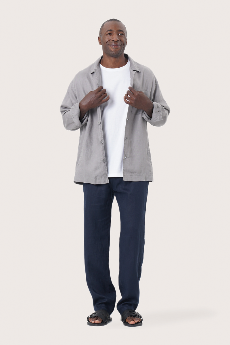 Model wearing the grey linen Maverick jacket by By The Sea Bali