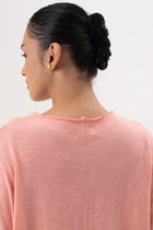 Back view detail of the Mawa Cotton T-Shirt Pink highlighting the garment shape and drape.