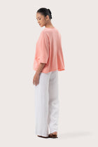 Back view of the Mawa Cotton T-Shirt Pink highlighting the garment shape and drape.