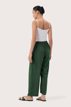 Back view of the Maya Drawstring Pants Forest Green highlighting the garment shape and drape.