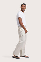 Side profile of the Cotton Relax Drawstring Pant in Creme by By The Sea Bali, crafted in pure cotton