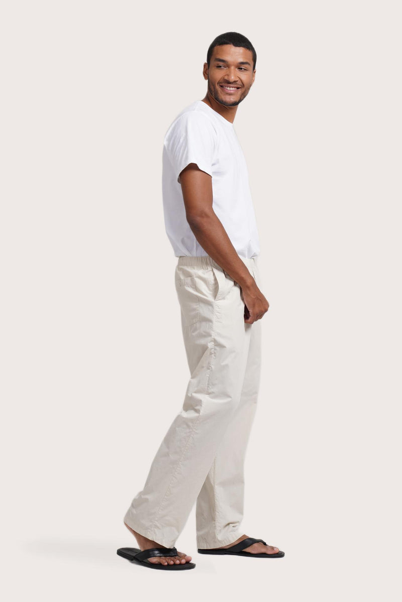 Side profile of the Cotton Relax Drawstring Pant in Creme by By The Sea Bali, crafted in pure cotton