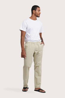 Side view of the Cotton Relax Drawstring Pant in Light Grey Green by By The Sea Bali in pure cotton
