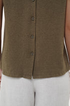 By The Sea Bali Lightweight fabric and refined detail highlighting the Mera Sleeveless Top's breathable feel