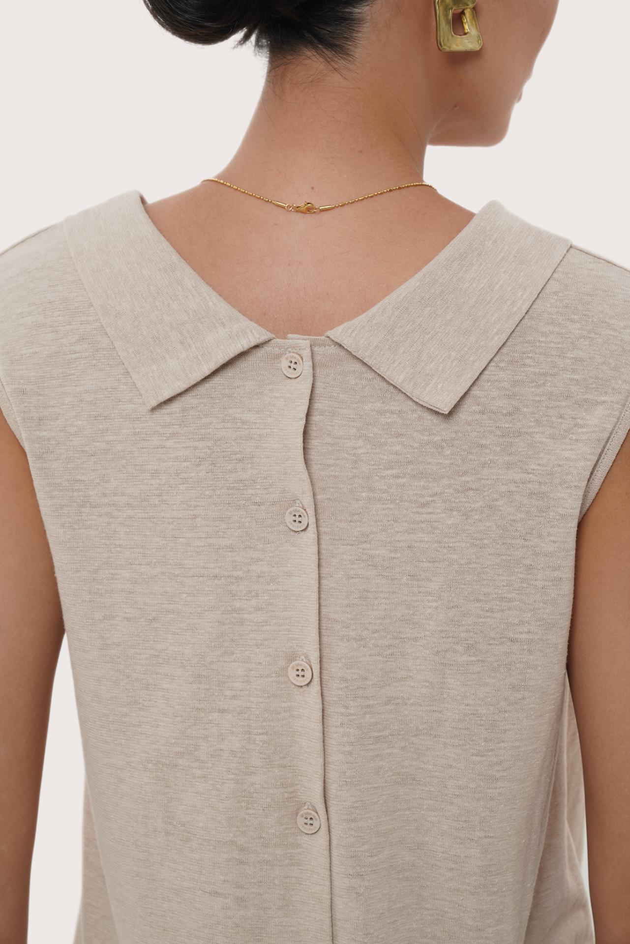By The Sea Bali Lightweight fabric and tailored detail highlighting the Mera Sleeveless Top's breathable feel