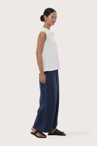 By The Sea Bali Side profile of the Mera Sleeveless Top showcasing its relaxed fit and fluid drape