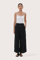 By The Sea Bali Merca Wrap Pant in Black featuring a relaxed and elegant resort silhouette